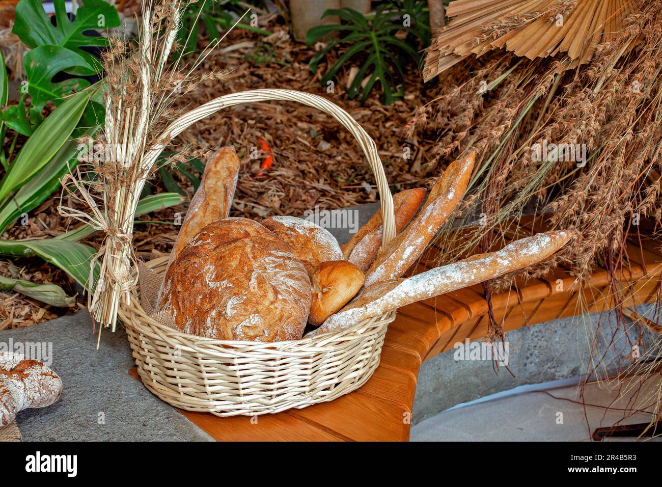 Country bread in a basket Stock Photo