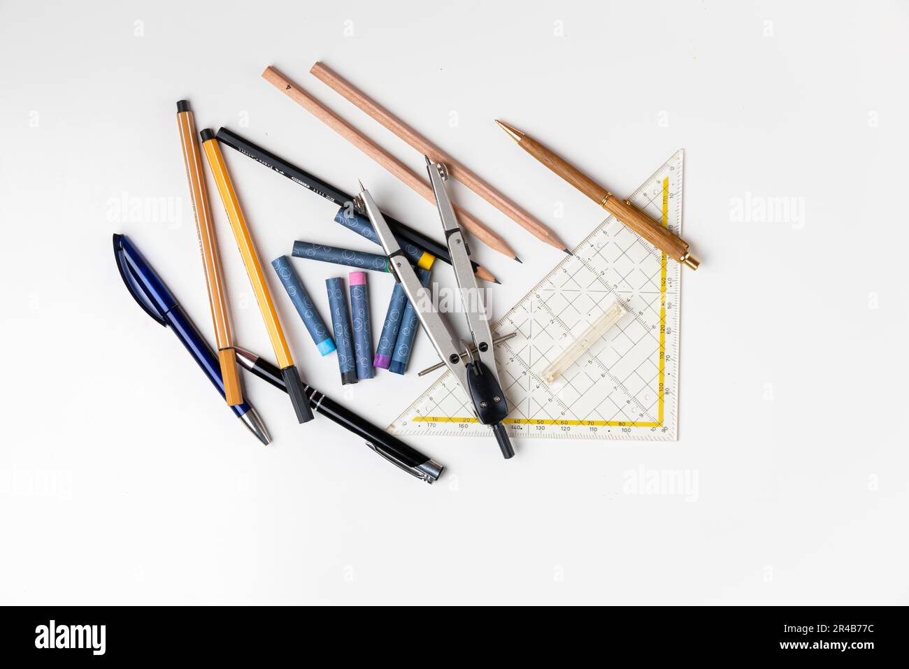 https://c8.alamy.com/comp/2R4B77C/writing-and-drawing-utensils-school-supplies-white-background-2R4B77C.jpg