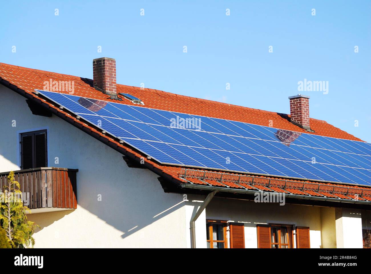 Photovoltaic, Electricity generation with solar panels on the roof Stock Photo