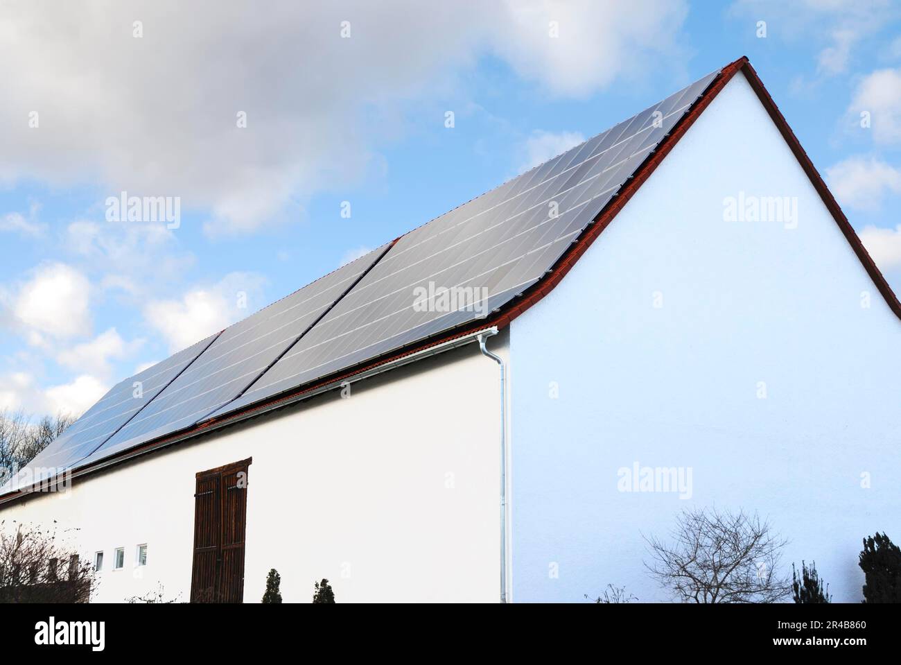 Photovoltaic, Electricity generation with solar panels on the roof Stock Photo