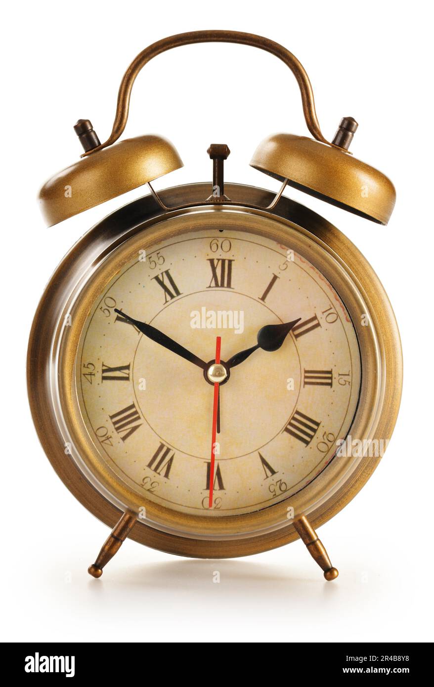 Old alarm clock isolated on white background Stock Photo - Alamy