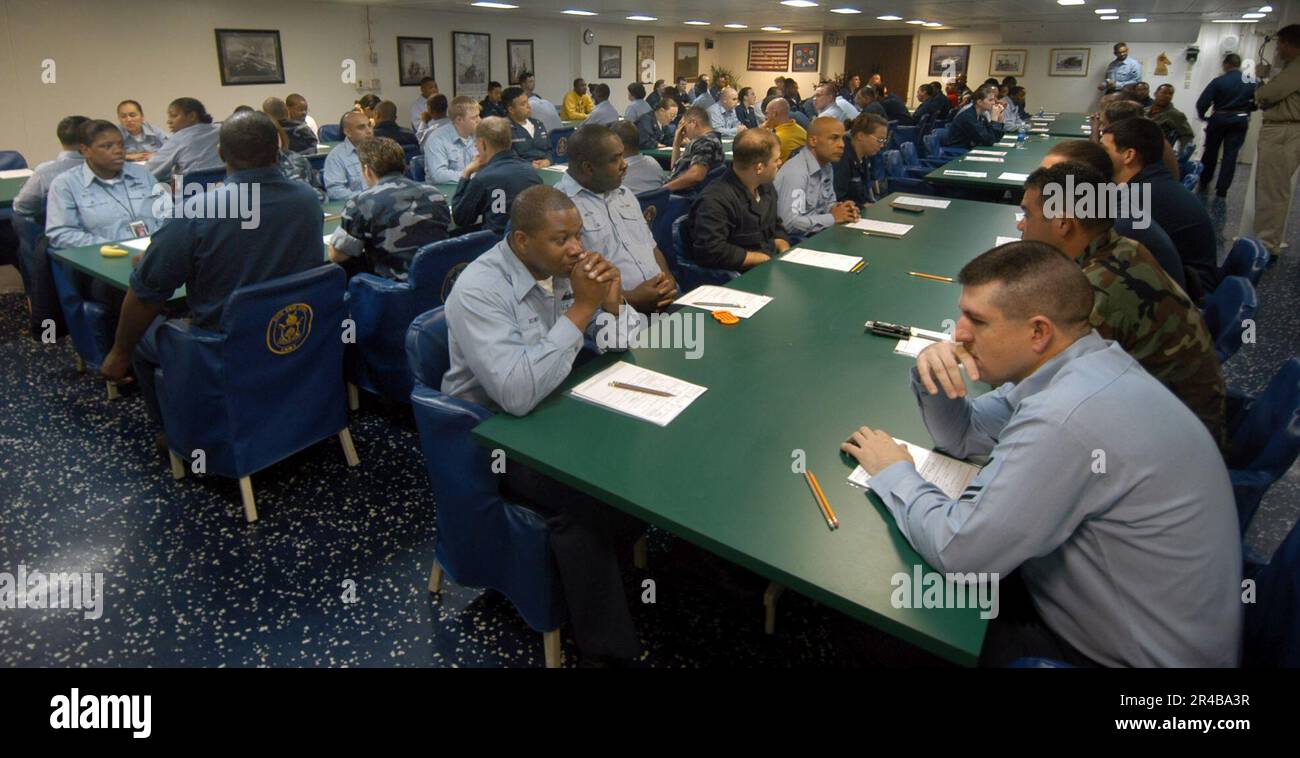US Navy Second Class Petty Officers wait patiently to begin the First
