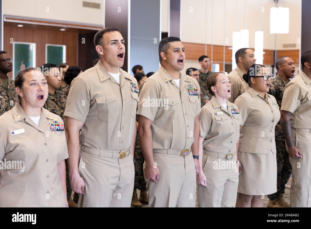 U.S. Navy Chief Petty Officers stand at attention during the 130th Chief Petty Officer Birthday cake cutting ceremony, Marine Corps Base Hawaii, March 31, 2023. The celebration commemorated 130 years of lineage for Chief Petty Officers across MCBH. Stock Photo