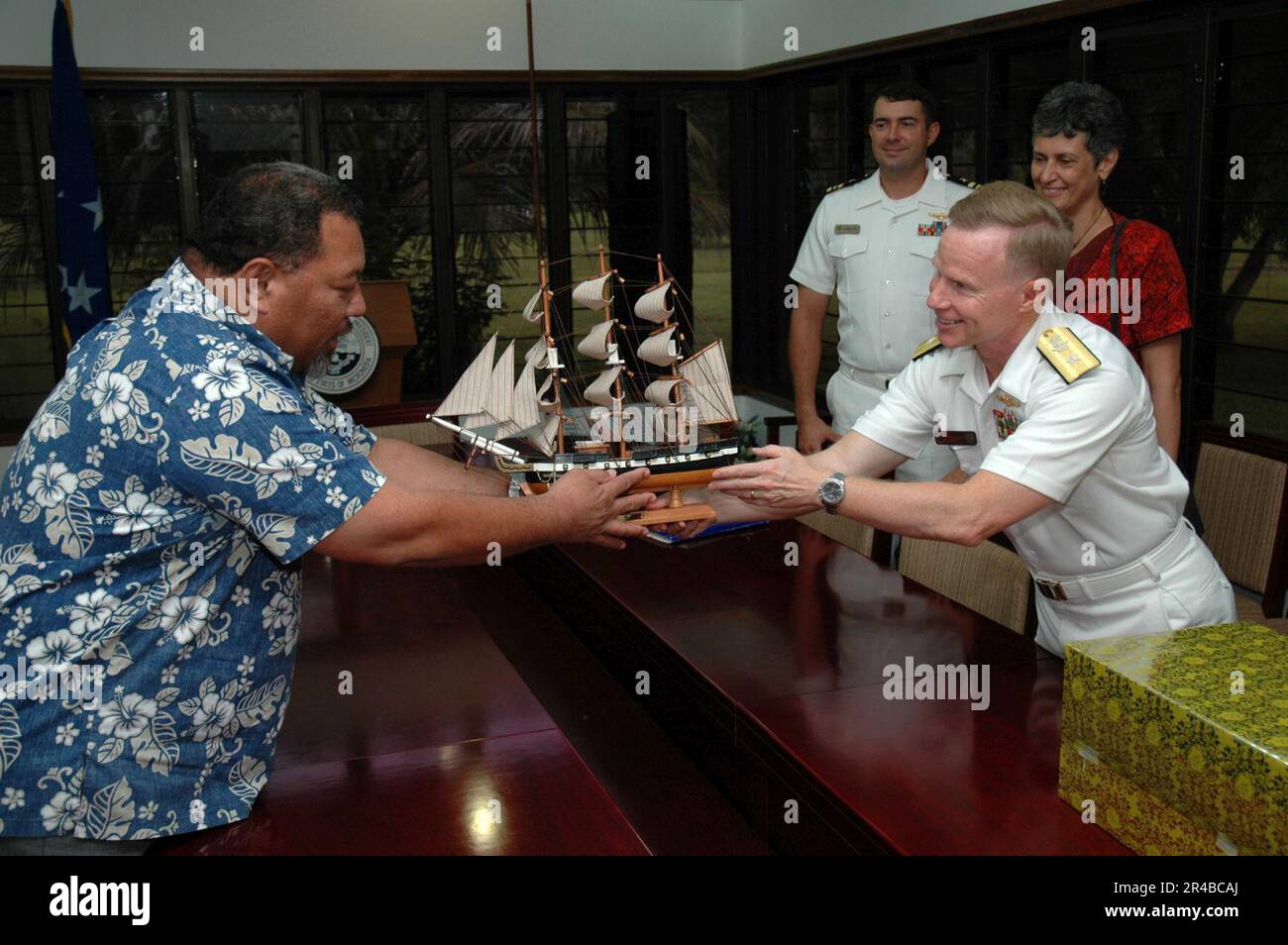 US Navy  Commander, U.S. Naval Forces Marianas, Rear Adm. Charles J. Leidig presents a model of the frigate USS Constitution to the President of the Federated States of Micronesia. Stock Photo