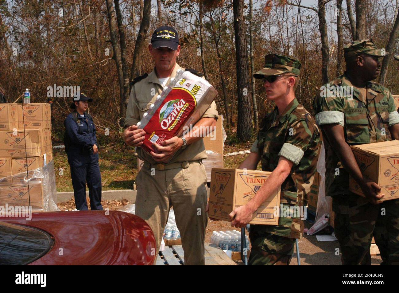 US Navy U.S. Navy Seabees stationed in Gulfport, Miss., help load food