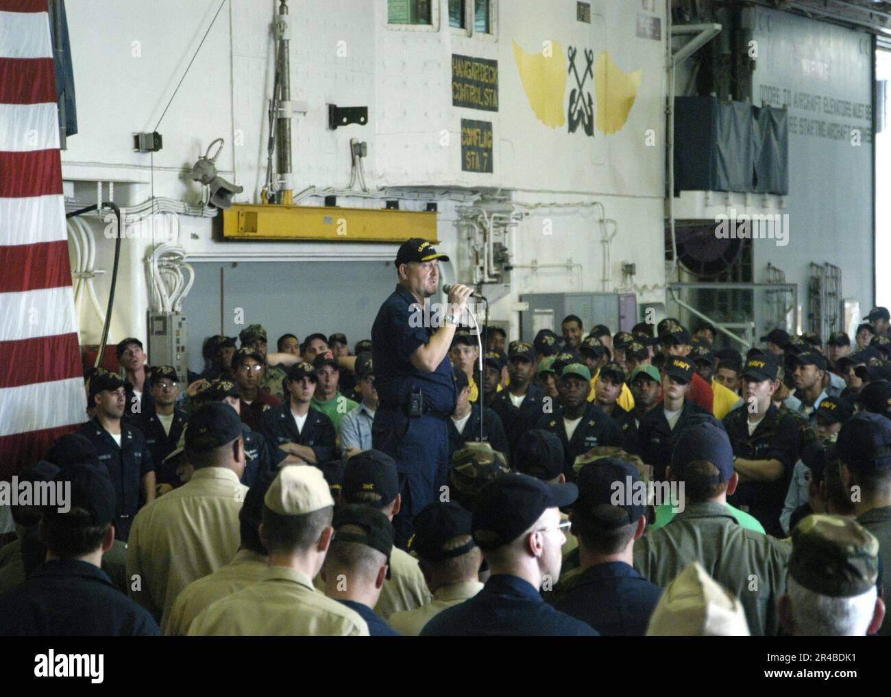US Navy  U.S. Coast Guard Vice Adm. Thad W. Allen, principle federal official (PFO) for federal response to Hurricane Katrina, addresses the crew of the amphibious assault ship USS Iwo Jima (LHD 7). Stock Photo