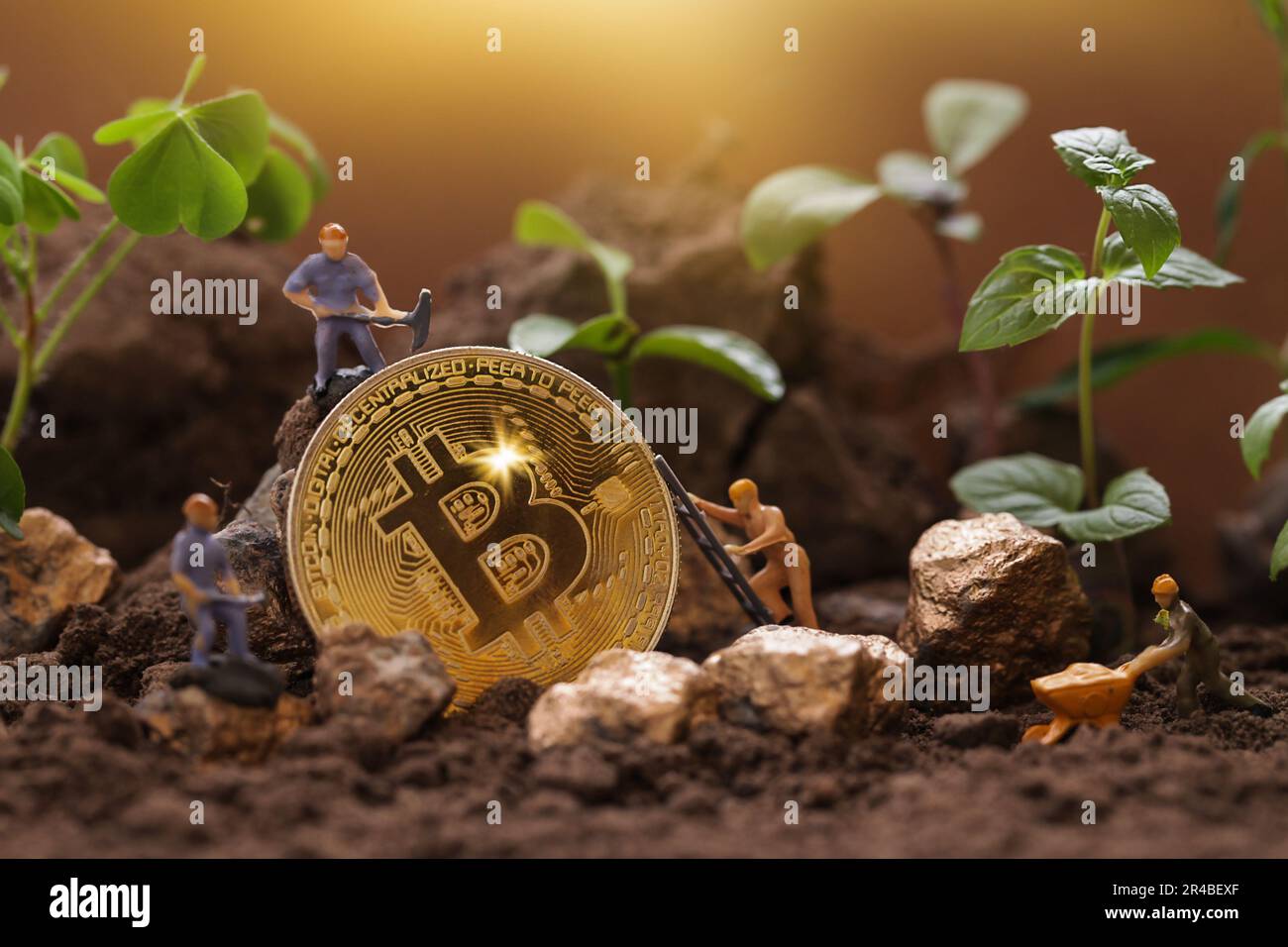 Sustainability Green Cryptocurrency Mining. Blockchain, Miner figurines  digging ground to uncover big Gold bitcoin. Eco-friendly cryptocurrencies  Stock Photo - Alamy