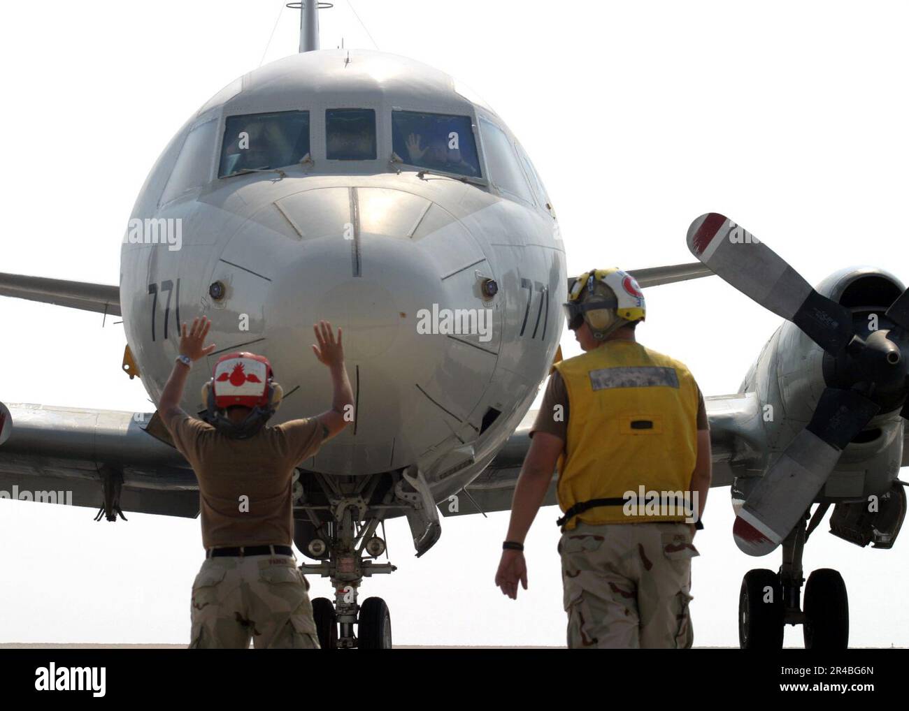 US Navy  U.S. Navy Aviation Ordnanceman 3rd Class left, assigned to the Pelicans of Patrol Squadron Four Five (VP-45). Stock Photo