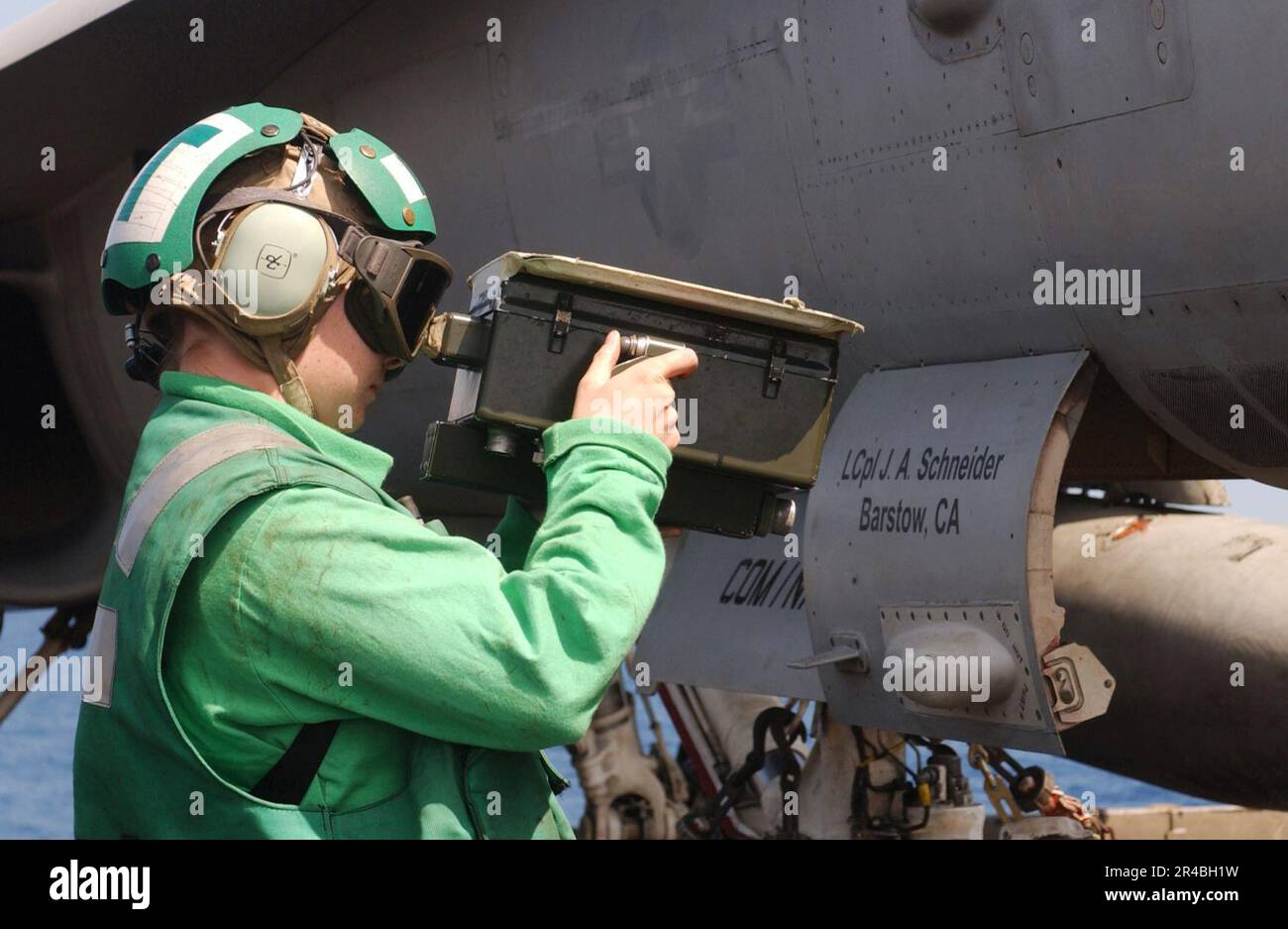 US Navy Aviation Electronics Technician 3rd Class uses an