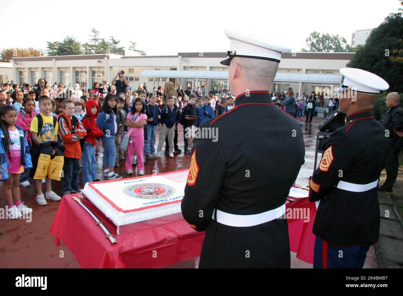 US Navy The youngest and oldest Marine stand ready to celebrate the