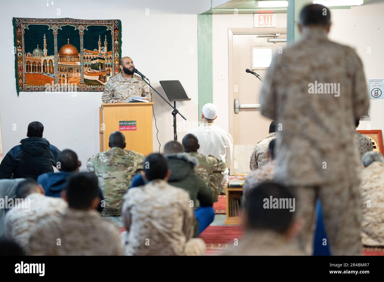 Saudi Royal Air Force Col. Khaled Husaan, delivers the Khutbah, or sermon, in Arabic during the Friday noon religious service, Jum’ah, April 7, 2023 at the Interfaith Chapel on Joint Base San Antonio-Lackland. The month between 22 March - 21 April 2023 coincides with the month of Ramadan on the Islamic calendar. During this month, faithful Muslims fast during the day and eat in the evening during the “Iftar” at sunset. The U.S. Air Force Chaplain Corps provides for the spiritual needs of all servicemen and mission partners training at JBSA, no matter their faith tradition. Stock Photo