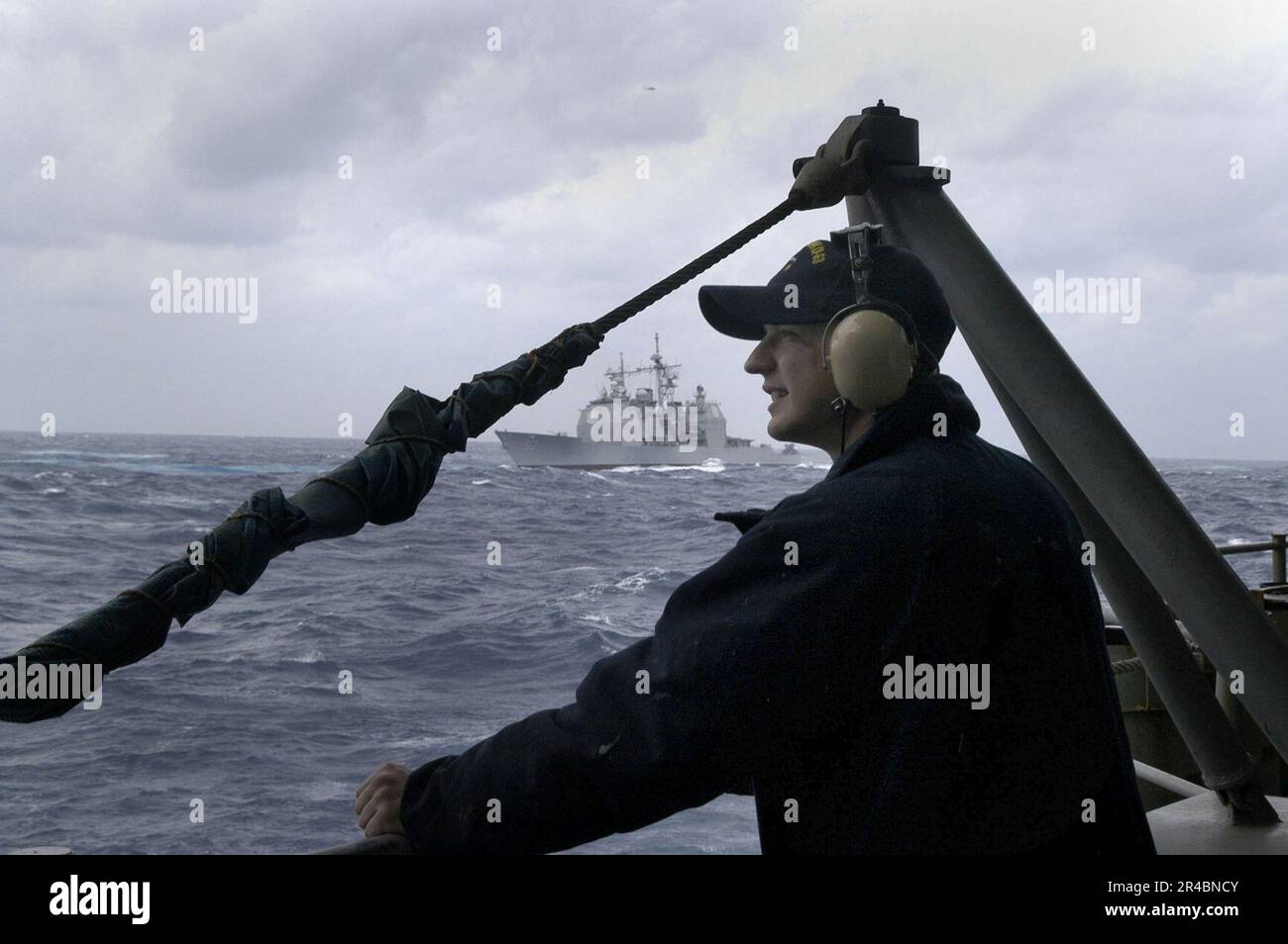 US Navy Seaman stands lookout aboard the conventionally powered ...