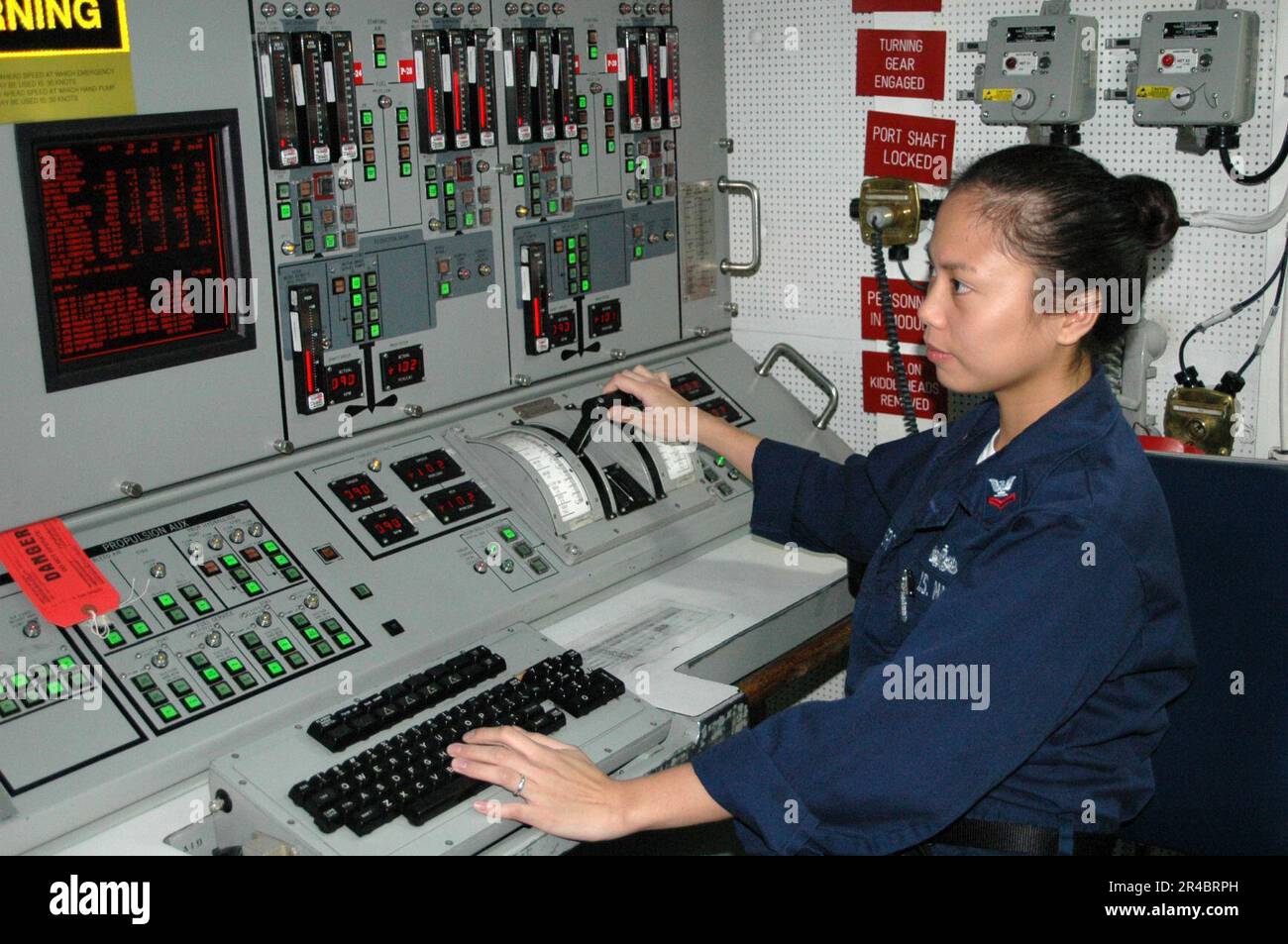 US Navy Gas Turbine System Technician 2nd Class stands watch at the