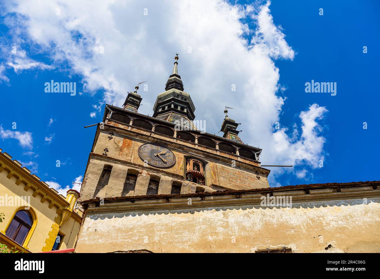 A vintage architecture structure featuring a clock and decorative spire