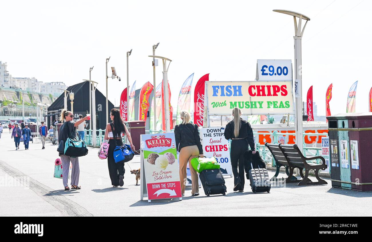 Brighton UK 27th May 2023 - Visitors start to arrive on Brighton seafront as they enjoy the bank holiday weekend sunshine which is forecast for most of the UK over the next few days : Credit Simon Dack / Alamy Live News Stock Photo