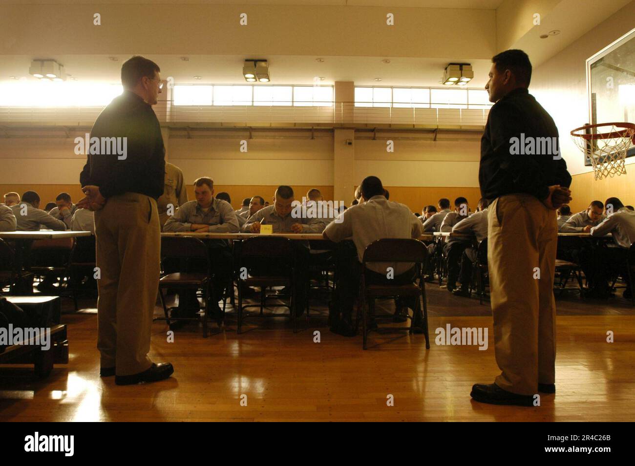 US Navy Two chiefs monitor Sailors assigned to the conventionally