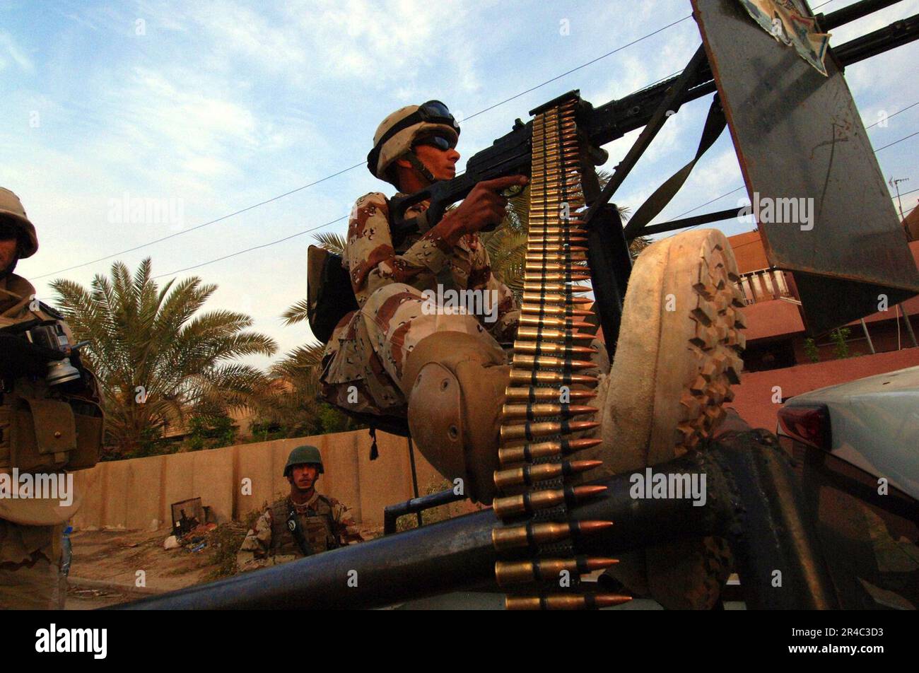 US Navy An Iraqi army soldier provides street corner security during