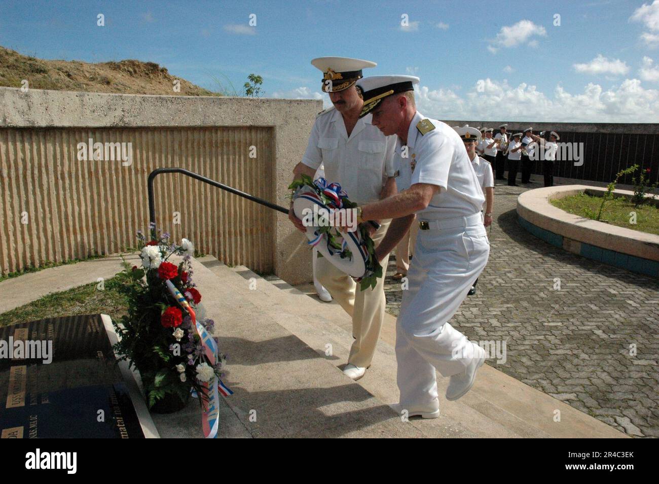 US Navy  Chief of Staff of Russian Federated Navy Vice Adm. Konstantin Sidenko, and Commander of U.S. Naval Forces Marianas (NNS) Rear Adm. Joe Leidig prepare to place a wreath at the War in the Pacific Nati. Stock Photo