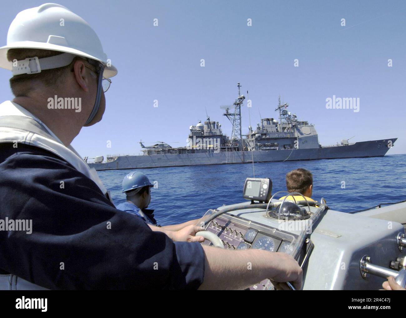US Navy Chief Boatswain's Mate looks toward the Ticonderogaclass