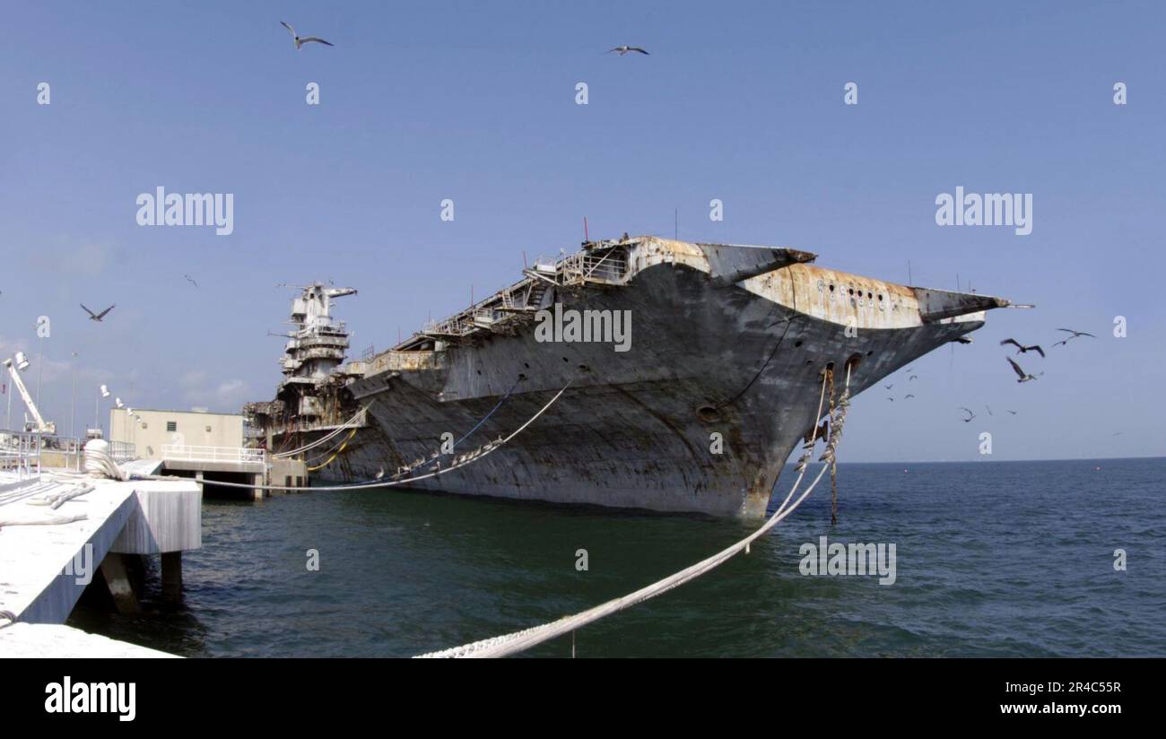 US Navy aircraft carrier USS Oriskany (CVA 34) sits in port at Naval Air Station