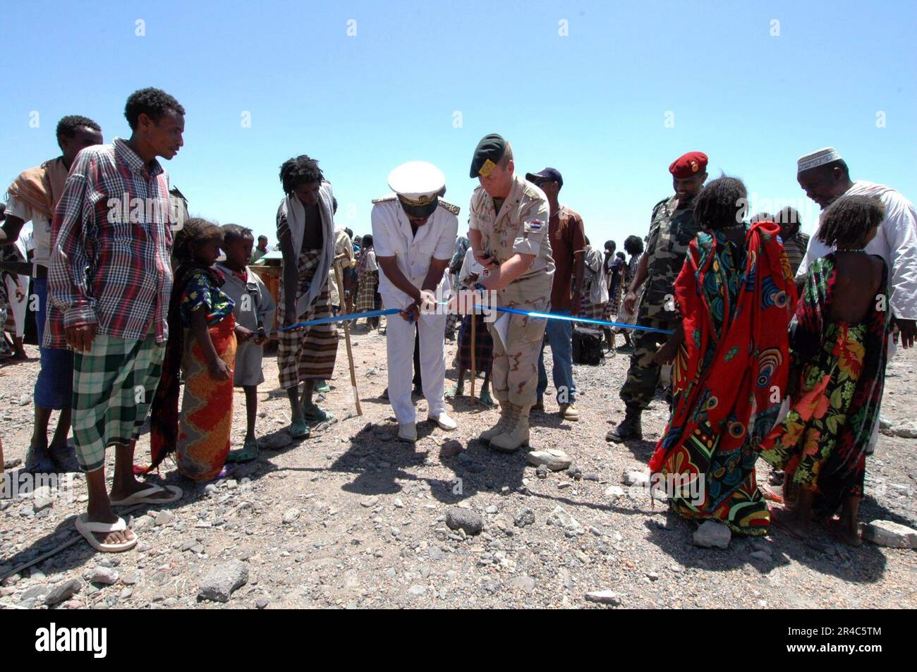 US Navy  Commisar of the Dikhil region of Djibouti, Africa, Mr. Moussa Djama, left and Lt. Col. cut the ribbon during a well dedication. Stock Photo
