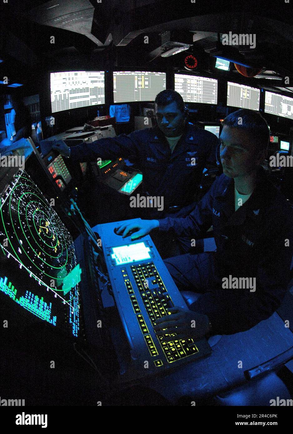 US Navy  Air Traffic Controller 3rd Class tracts departures of aircraft in Carrier Air Traffic Control Center (CATTC). Stock Photo