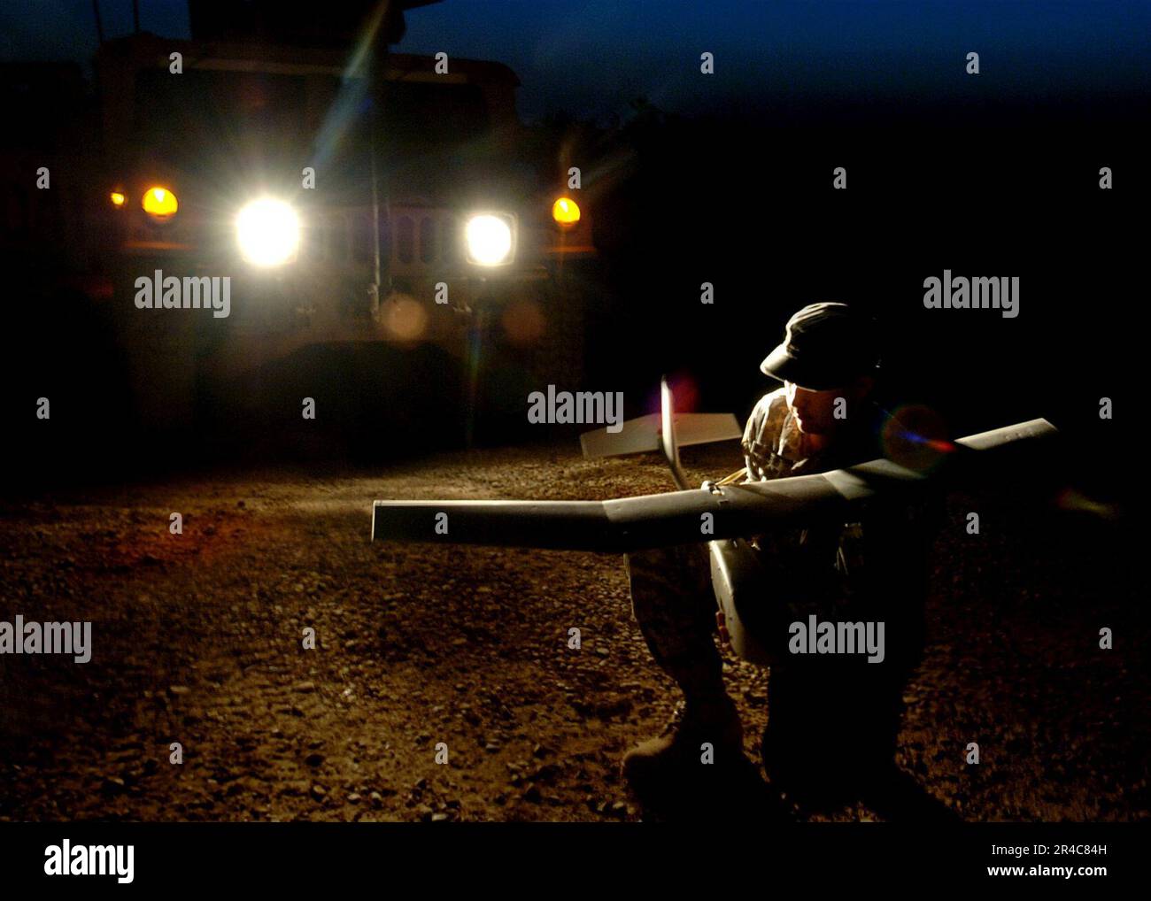 US Navy  Pvt. assigned to the 4th Battalion, 42nd Field Artillery Regiment, 1st Brigade Combat Team, 4th Infantry Division, assembles an RQ-11 Raven Unmanned Aerial Vehicle (UAV). Stock Photo