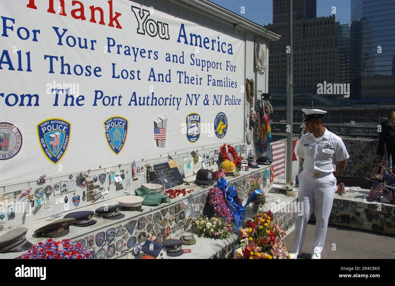 US Navy Chief Boatswain's Mate views a memorial at the World Trade Center Ground Zero site Stock