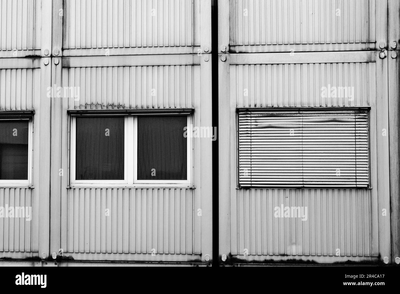 A grayscale of windows of an old cargo house Stock Photo Alamy