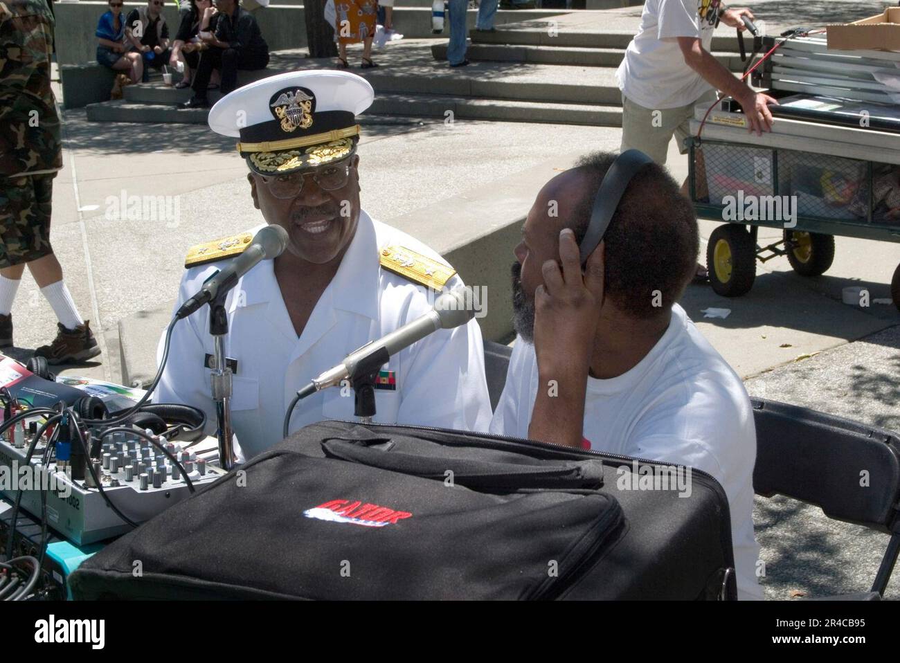US Navy  Reserve Deputy Commander, Commander Navy Installations, Rear Adm. Julius Caesar, conducts a radio interview with KPOO-89.5 FM radio during festivities at the annual Juneteenth Festival. Stock Photo