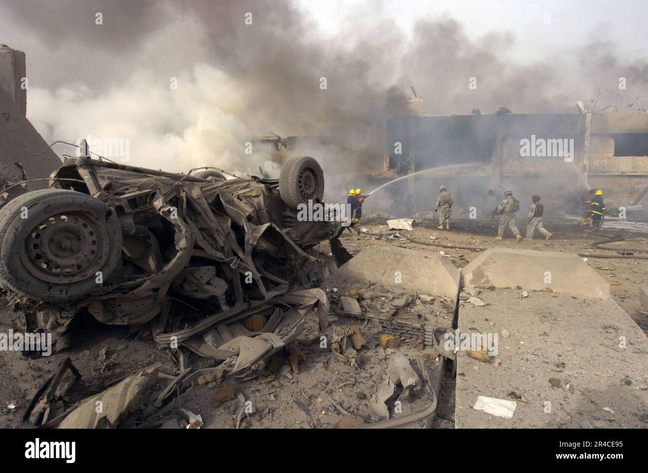 US Navy  A Vehicle Born Improvised Explosive Devise (VBIED) after exploding on a street outside of the Al Sabah newspaper office in the Waziryia district of Baghdad, Iraq. Stock Photo
