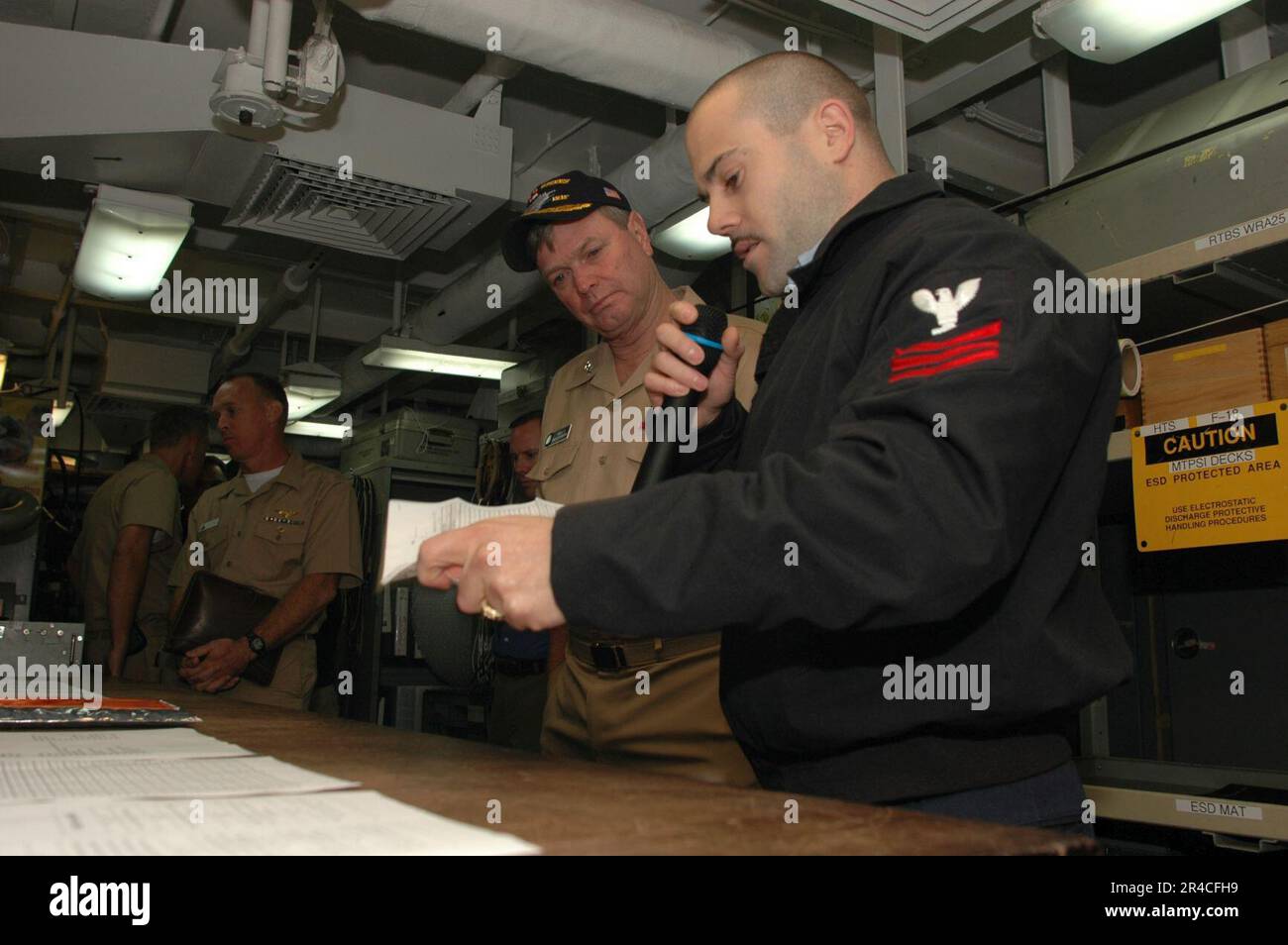 Vice Guard Tech US Navy Aviation Electronics Technician 1st Class talks with Vice Adm ...