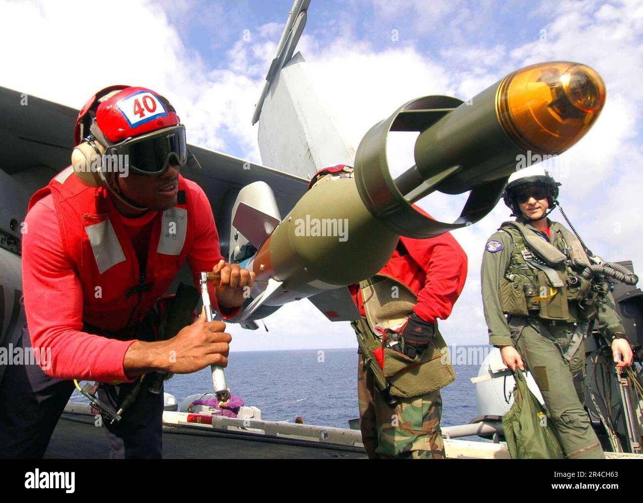 US Navy Aviation Ordnanceman Airman assigned to the ''Wildcats'' of ...