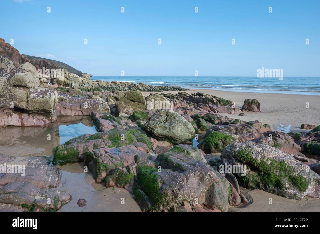 Rocks formation located at end of beach at Freshwater East ...