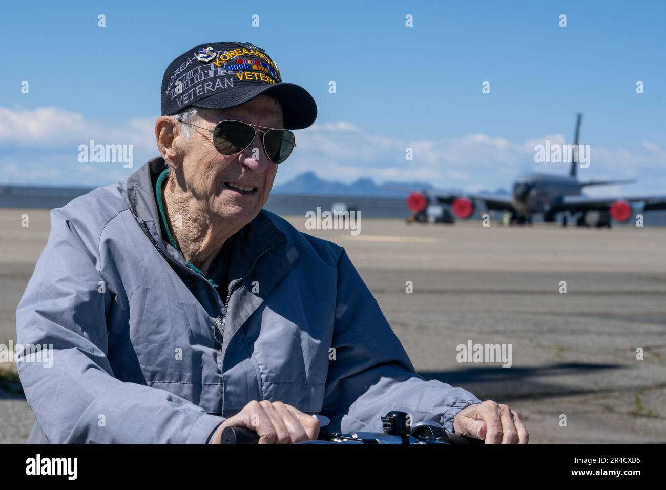 Retired Master Sgt. Eugene T. Beal enters the flightline April 3, 2023, at Beale Air Force Base, California. Eugene enlisted in March 1952, and was sent to fight in the Korean War as a tail gunner in the B-29 Superfortress. Eugene spent most of his career as a boom operator in the KC-97 Stratofreighter and the KC-135 Stratotanker. Stock Photo