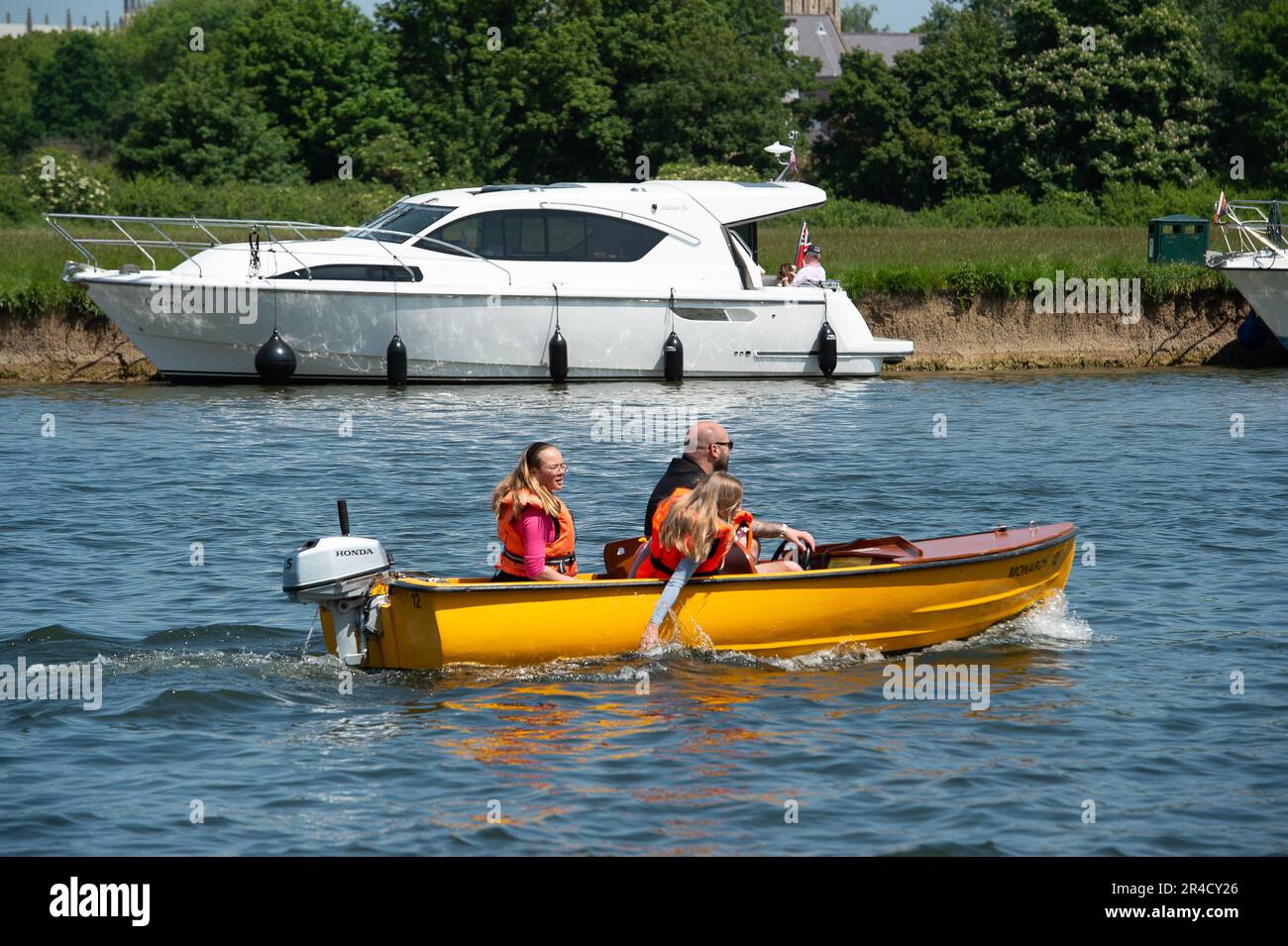 Windsor, Berkshire, UK. 27th May, 23. People were enjoying hiring boats and taking them for a trip along the River Thames in Windsor today on a warm and sunny bank holiday Saturday. Credit: Maureen McLean/Alamy Live News Stock Photo