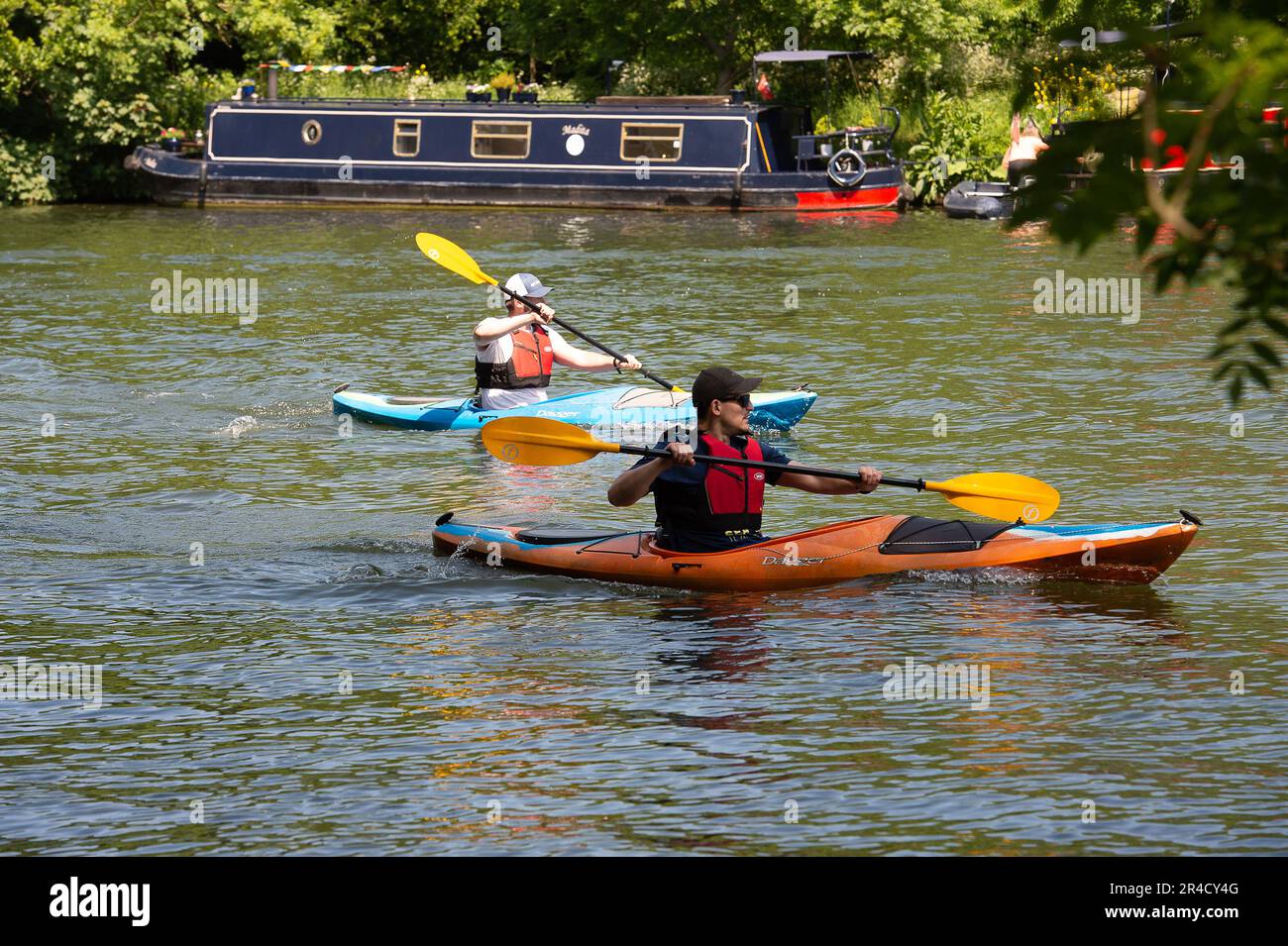 Windsor, Berkshire, UK. 27th May, 23. Kayaks out on the River Thames in Windsor today. Credit: Maureen McLean/Alamy Live News Stock Photo