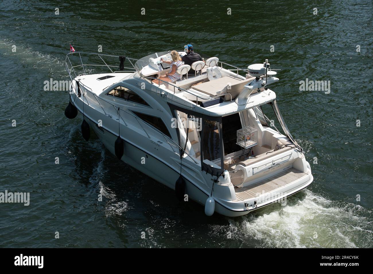 Windsor, Berkshire, UK. 27th May, 23. It was a beautiful warm and sunny day in Windsor, Berkshire today. A lot of people bring their cruising boats down to Windsor for the bank holiday weekends. Credit: Maureen McLean/Alamy Live News Stock Photo