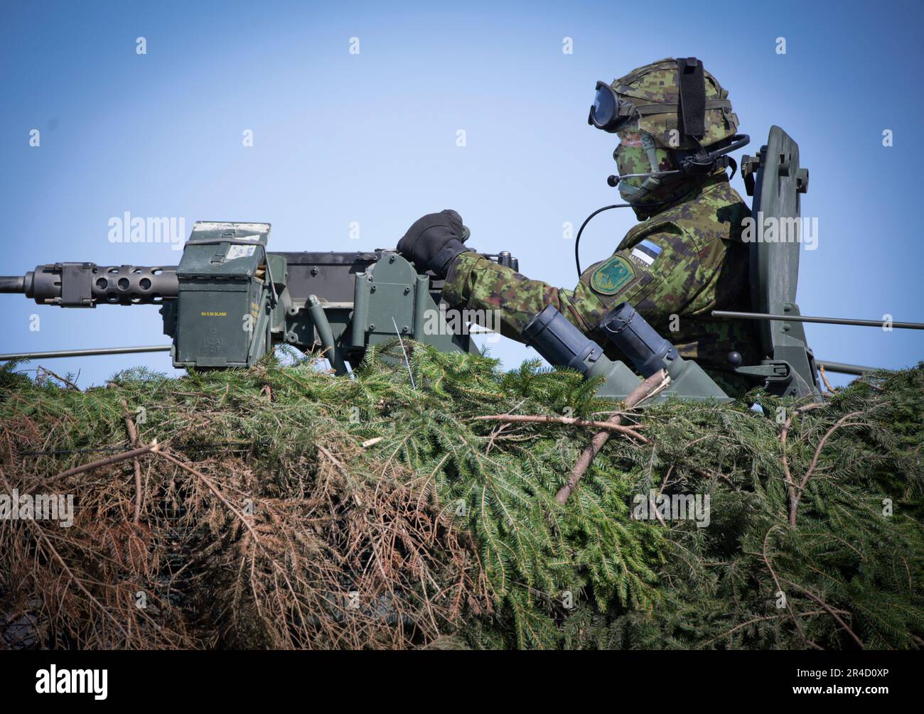 An Estonian soldier is seen in a camouflaged armoured personnel carrier in Tapa, Estonia on 20 May, 2023. Estonia is hosting the Spring Storm NATO exercises involving over 13 thousand personnel with US, German, British, French and Polish forces training together with the Estonian Defence Forces (eDF). (Photo by Jaap Arriens / Sipa USA) Stock Photo