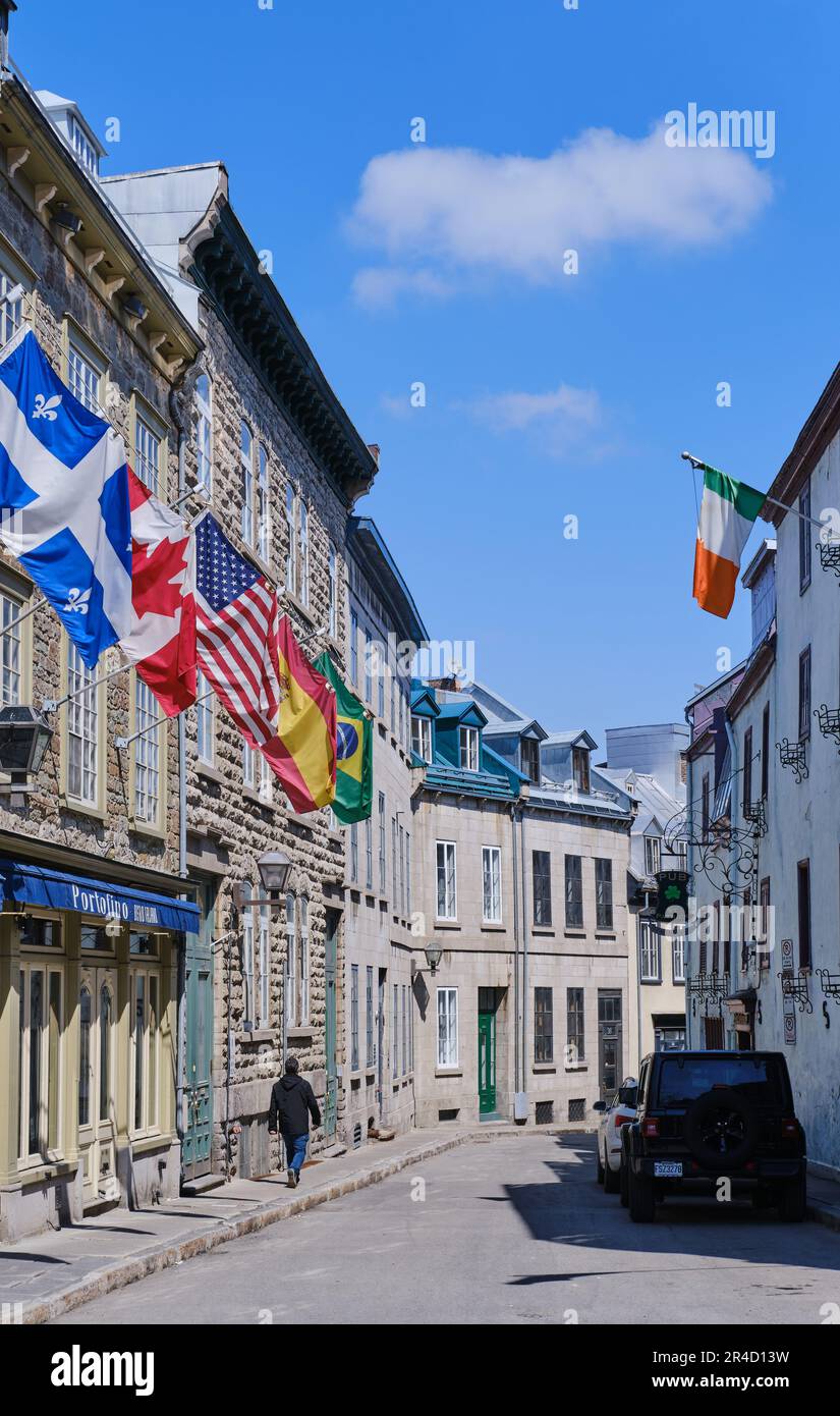 Flags of Quebec, Canada, USA and Spain outside a building in the old town, Quebec City, Canada Stock Photo