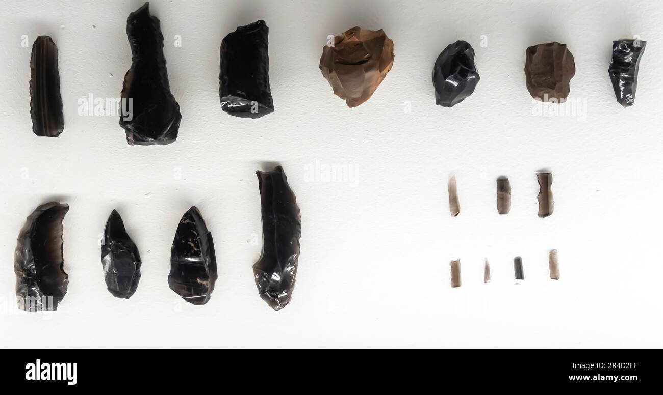 Nuclei, burins, bladelets, tools. Obsidian, flint. 10000 - 8000 before present. Pechka, Apnagyugh, Mulki, Stock Photo