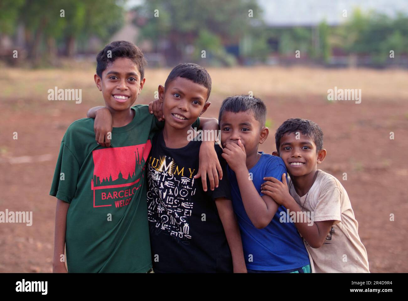 Maumere, Flores, Indonesia- May 23, 2023: Asian boys smiling looking at the camera. Stock Photo