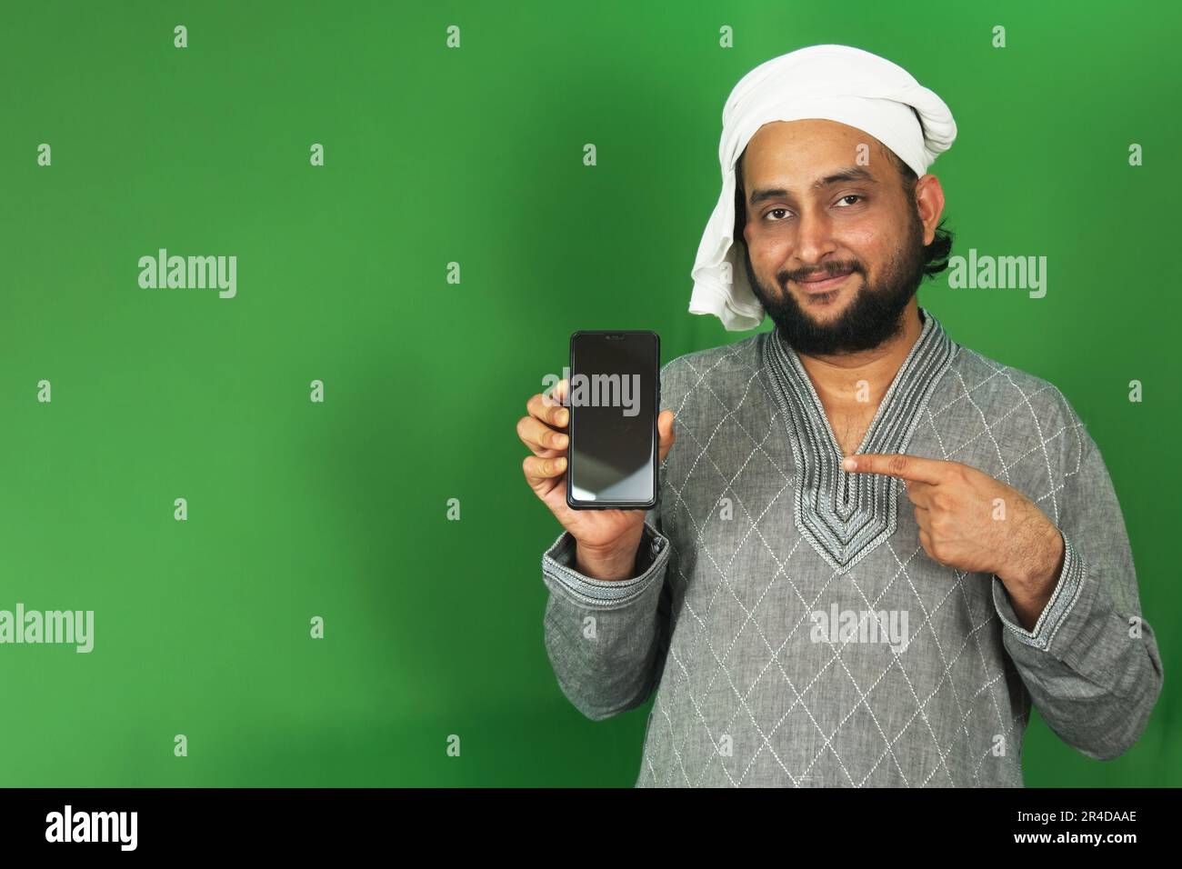 Young Indian Farmer Showing His Mobile on Right Hand With One Finger In ...