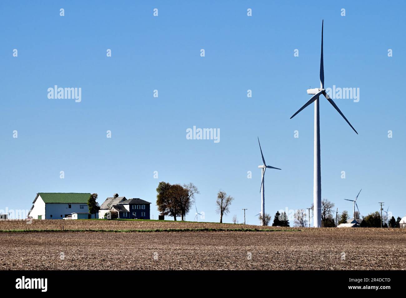 Malta, Illinois, USA. Wind turbines on farms in an agricultural section of northern Illinois. Stock Photo