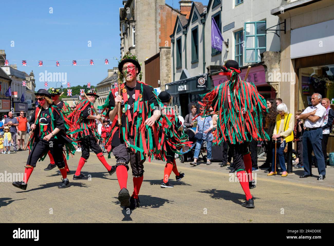 Chippenham, UK, 27th May, 2023. Morris dancers from the Alton Morris from Alton in Hampshire are pictured entertaining the crowd during the opening day of the 2023 Chippenham folk festival. The 2023 festival is the festivals 50th Anniversary. Credit: Lynchpics/Alamy Live News Stock Photo