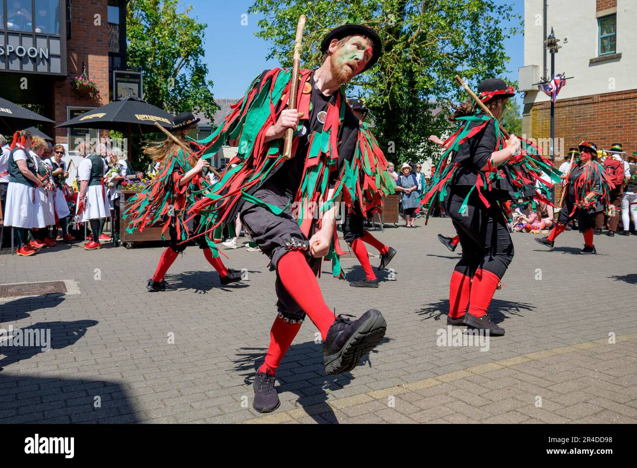 Chippenham, UK, 27th May, 2023. Morris dancers from the Alton Morris from Alton in Hampshire are pictured entertaining the crowd during the opening day of the 2023 Chippenham folk festival. The 2023 festival is the festivals 50th Anniversary. Credit: Lynchpics/Alamy Live News Stock Photo