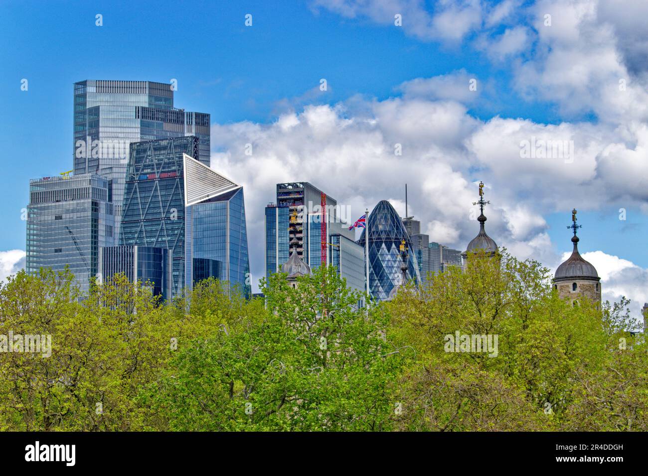 London the Towers of the Tower of London alonside the many towers of the Skyscrapers Stock Photo