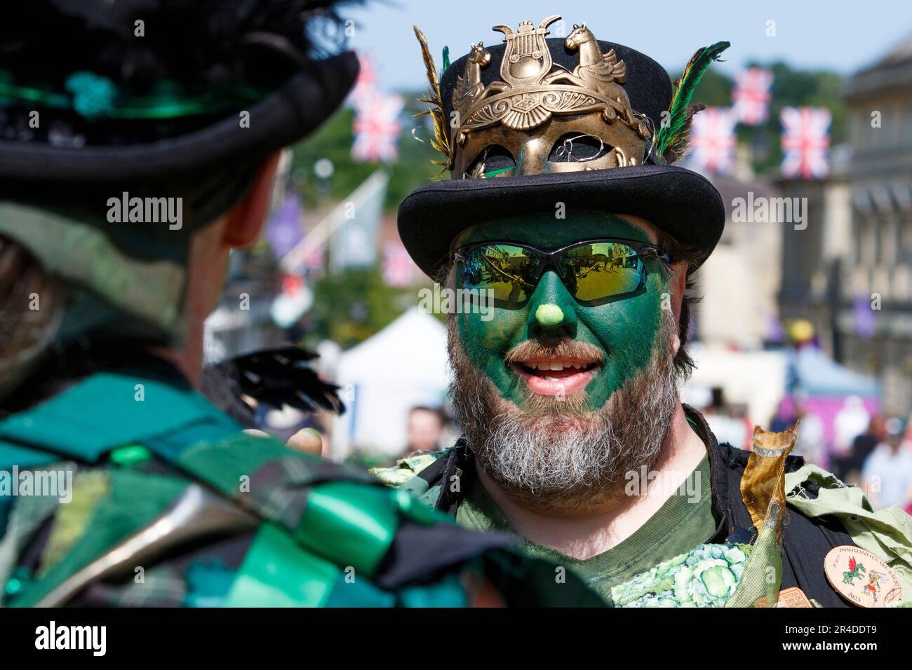 Chippenham, UK, 27th May, 2023. Morris dancers from the Sutton Masque from the Cambridgeshire fens are pictured entertaining the crowd during the opening day of the 2023 Chippenham folk festival. The 2023 festival is the festivals 50th Anniversary. Credit: Lynchpics/Alamy Live News Stock Photo
