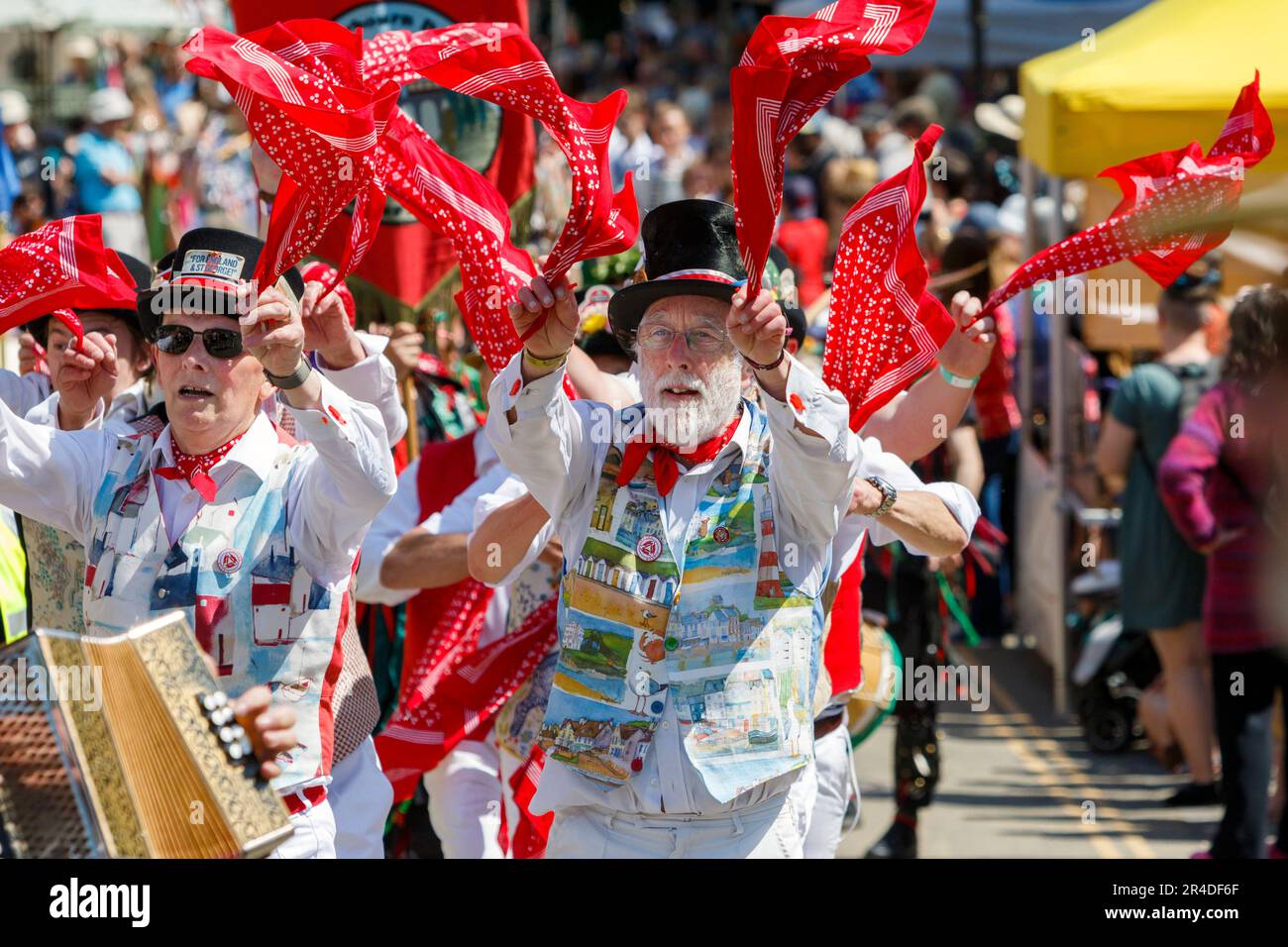 Chippenham, UK, 27th May, 2023. Morris dancers from the Tinners Morris from South Zeal, Devon are pictured as they take part in the parade on the opening day of the 2023 Chippenham folk festival. The 2023 festival is the festivals 50th Anniversary. Credit: Lynchpics/Alamy Live News Stock Photo