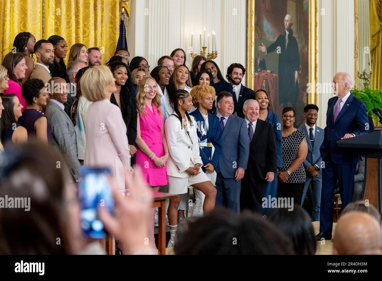 Washington, United States Of America. 26th May, 2023. Washington, United States of America. 26 May, 2023. U.S President Joe Biden, right, turns to the team as he delivers remarks during an event celebrating the Louisiana State University Tigers Women's Basketball championship win in the East Room of the White House, May 26, 2023, in Washington, DC Credit: Adam Schultz/White House Photo/Alamy Live News Stock Photo